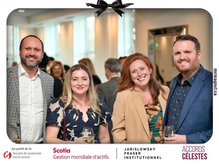 Two couples smiling at the cocktail reception